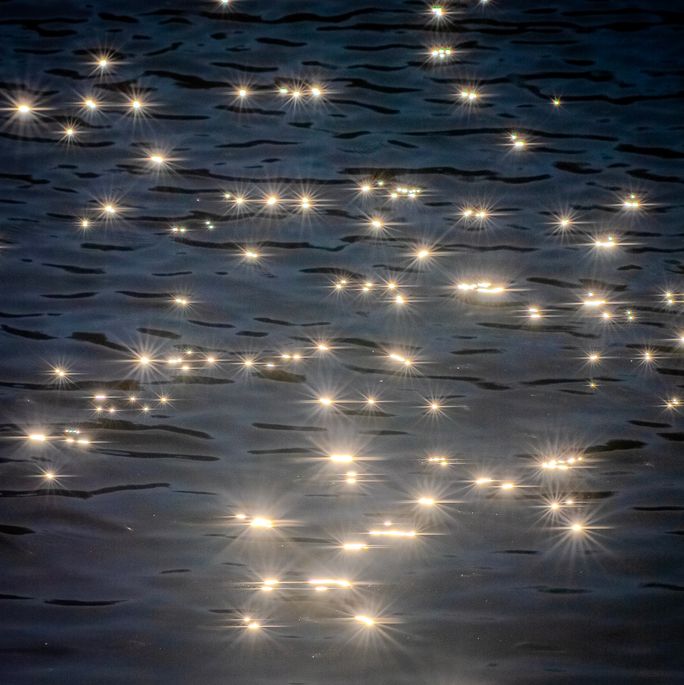 Sunlight reflecting off of the ripples of Great Falls